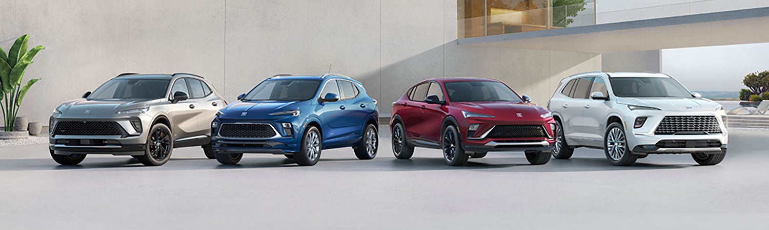 Line up of 4 buick, gmc cars and suvs